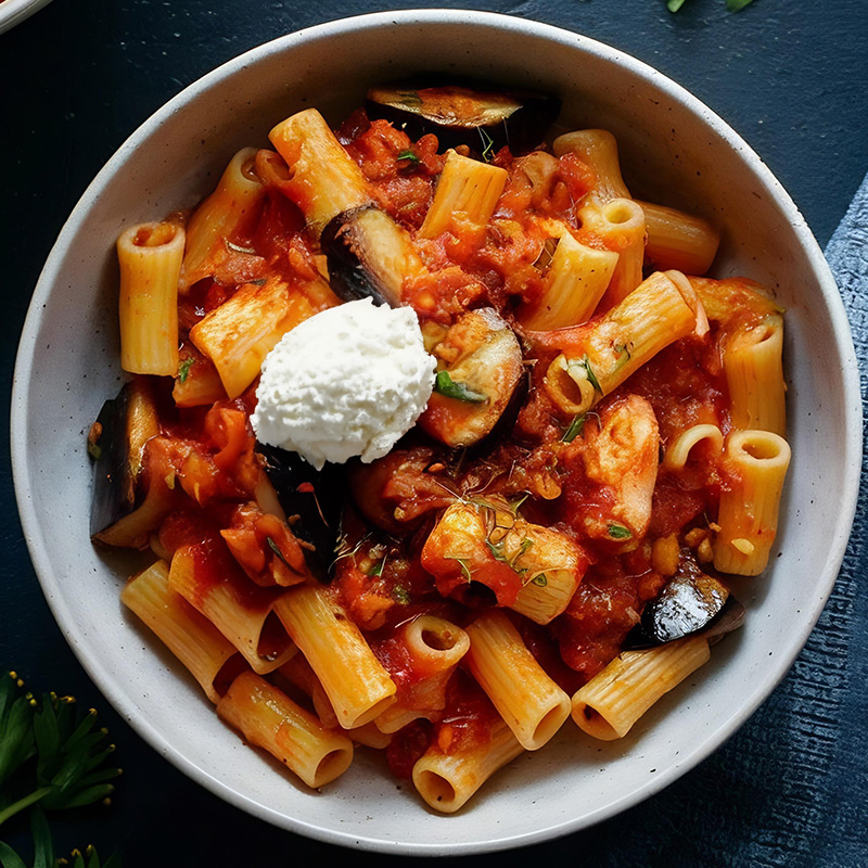 Rigatoni ALLA NORMA with herbed ricotta